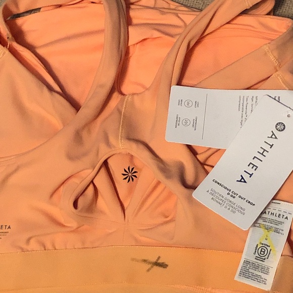 • New • Athleta Conscious Cut Out Crop A-DD/ Bright Peach Multi winner Host Pick - Picture 9 of 15